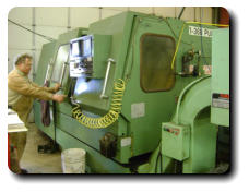 Working at the CNC lathe